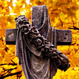 Steinernes Grabkreuz auf einem Friedhof / Jamie Sanford Steinernes Grabkreuz auf einem Friedhof